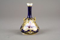 Lot 45 - A Royal Crown Derby miniature twin handled...