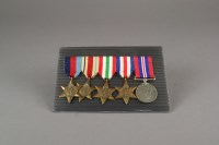 Lot 103 - A group of five World War II medals,...