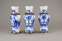 Lot 136 - Three Chinese blue and white Guan-type vases,...