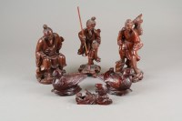 Lot 137 - A group of Chinese carved wood figures of...