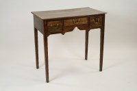 Lot 251 - A George III oak side table or low boy, the...