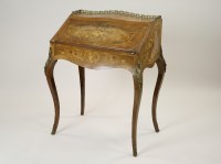 Lot 262 - A French Louis XV style walnut and inlaid...