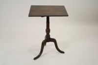 Lot 268 - A George III oak tripod table, the rectangular...