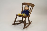 Lot 277 - A child's hardwood duck rocking chair, oak...