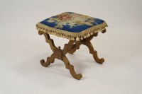 Lot 279 - A Victorian walnut X-framed stool with floral...