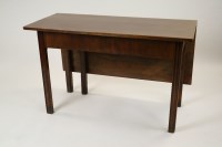 Lot 285 - A George III mahogany drop leaf dining table...