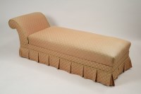 Lot 292 - A pink upholstered Ottoman day bed