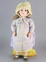 Lot 103 - A Tete Jumeau bisque headed bebe doll, wearing...