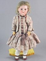 Lot 107 - A late 19th century German boy bisque head...