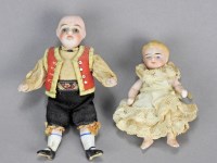 Lot 110 - A miniature Continental all bisque baby doll,...