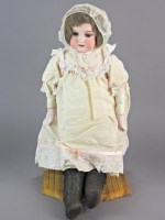 Lot 123 - An Armand Marsille bisque headed doll, mould...