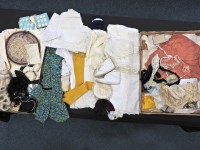 Lot 126 - A selection of dolls' clothing, accessories,...