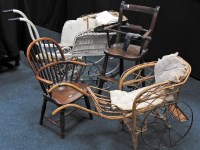 Lot 127 - Doll's prams, chairs, and other dolls'...