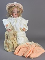 Lot 205 - A Gans and Seyfarth bisque head doll, wearing...