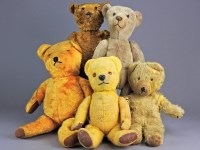 Lot 220 - A straw filled gold plush Steiff style teddy...