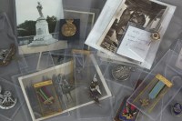 Lot 266 - A small quantity of militaria comprising...