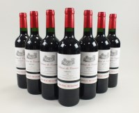 Lot 22 - Seven bottles of Chateau de Courneau Medoc...