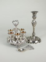 Lot 92 - A silver plated six egg cruet with six...