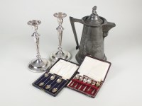 Lot 98 - A large pewter flagon/lidded jug, together...