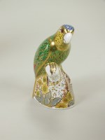 Lot 113 - A Royal Crown Derby Amazon green parrot...