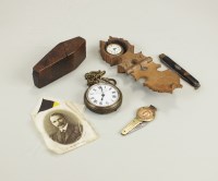 Lot 162 - A base metal pocket watch with white enamel...