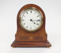 Lot 209 - An early 20th century arched top walnut cased...