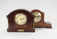 Lot 212 - An Edwardian mahogany and inlaid mantle clock...