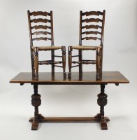 Lot 234 - An oak dining room suite comprising refectory...