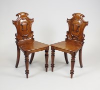 Lot 248 - A pair of Victorian oak hall chairs, mid 19th...