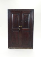 Lot 253 - An oak wall hanging corner cabinet, first half...