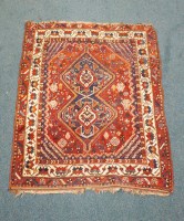 Lot 267 - A north west Persian rug, the field centred by...