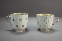 Lot 64 - Two Caughley porcelain fluted coffee cups,...
