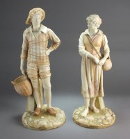Lot 113 - A pair of Royal Worcester blush ivory figures...