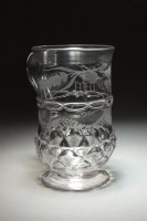 Lot 125 - An early 19th century glass cylindrical porter...