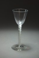 Lot 136 - An 18th century wine glass with air twist stem,...
