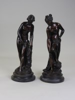 Lot 149 - A pair of bronze figures of bathers, after...