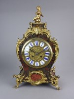 Lot 183 - A Louis XV style scarlet boulle and ormolu...