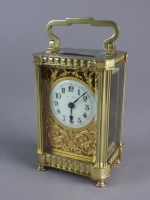 Lot 189 - A French brass carriage timepiece with five...