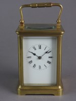 Lot 193 - A brass carriage clock with five glass case,...