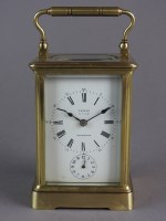 Lot 194 - A brass cased carriage clock with five glass...