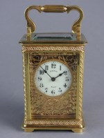Lot 197 - A French brass cased carriage timepiece the...