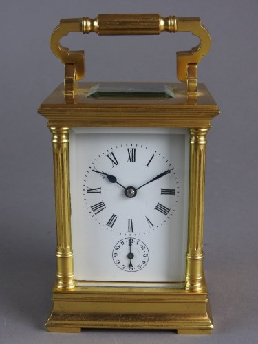 Lot 202 - A gilt brass cased carriage alarm clock with...
