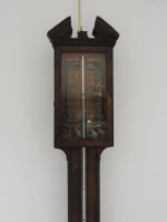 Lot 211 - A walnut stick barometer, 18th century with...