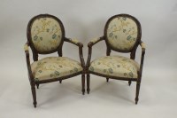 Lot 216 - A pair of Louis XVI style beech framed open...
