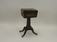 Lot 219 - A Regency rosewood and brass inlaid teapoy,...
