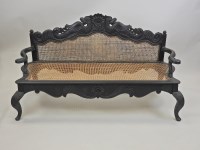 Lot 222 - An Anglo Indian colonial ebony settee, late...