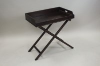 Lot 232 - A mahogany butler's tray on folding frame,...