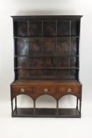 Lot 257 - A George III oak pot board dresser, late 18th...