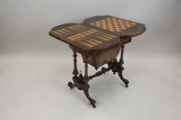 Lot 259 - A mid Victorian figured walnut boxwood strung...