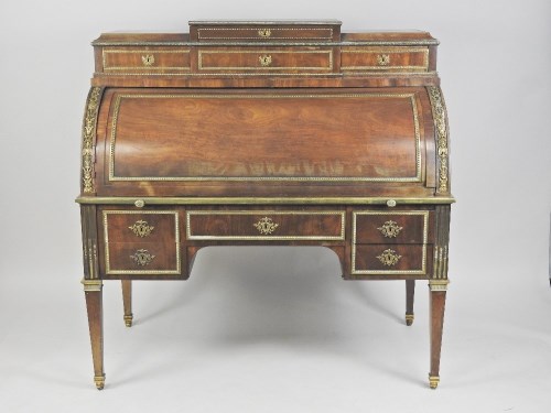 Lot 264 - A Louis XVI style mahogany and ormolu mounted...